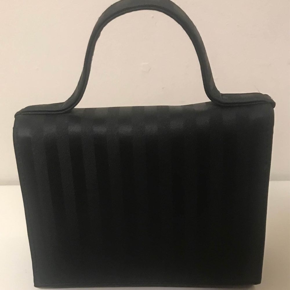 Small black purse snaps closed 6 3/4 X 6 Inches